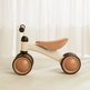 20960_bicicleta_de_equilibrio_4_rodas_bege_02_ambientada02-0u55pos1bu